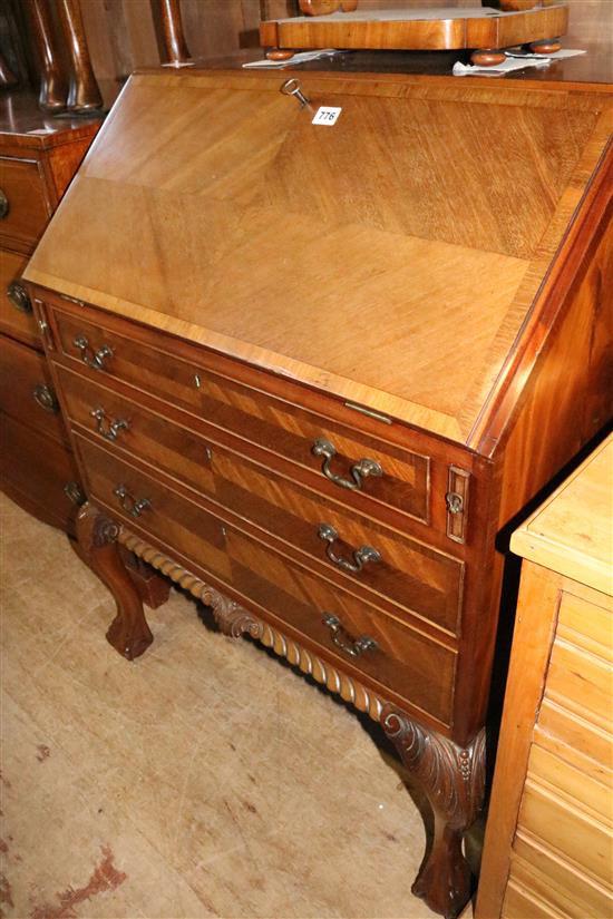 Mahogany bureau on ball and claw feet